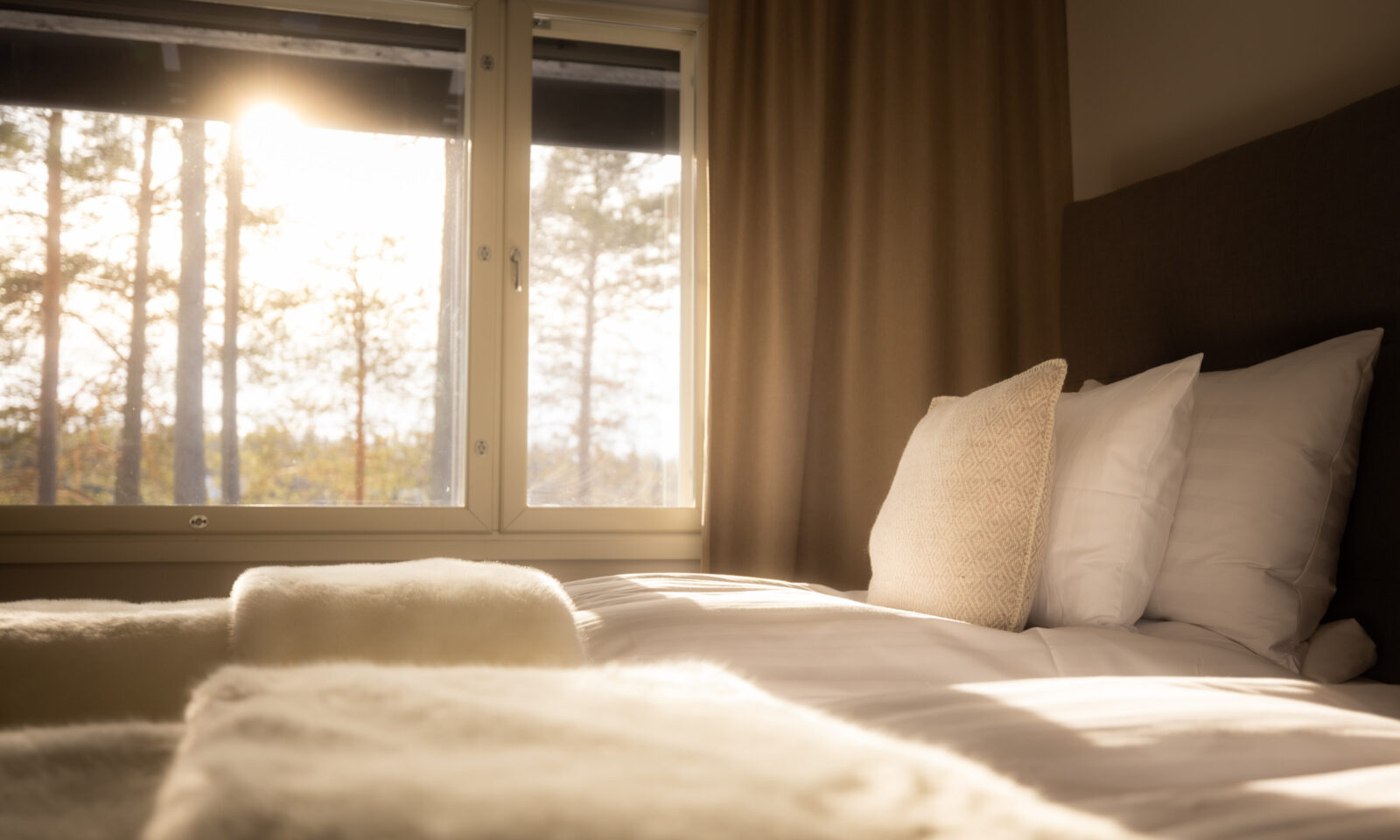 Cozy bedroom with natural light.