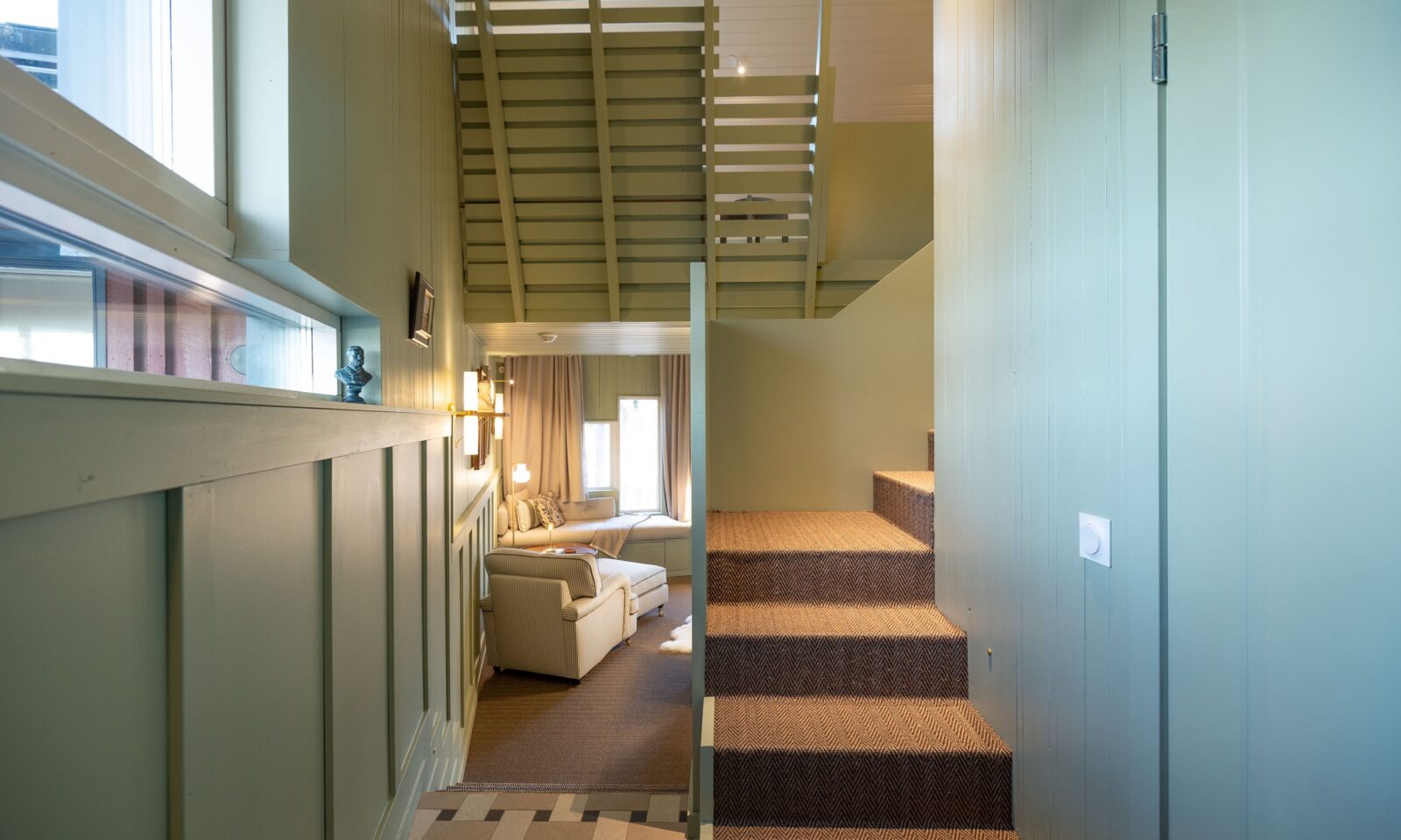 Aino Private Island Hotel River Suite with loft entrance green