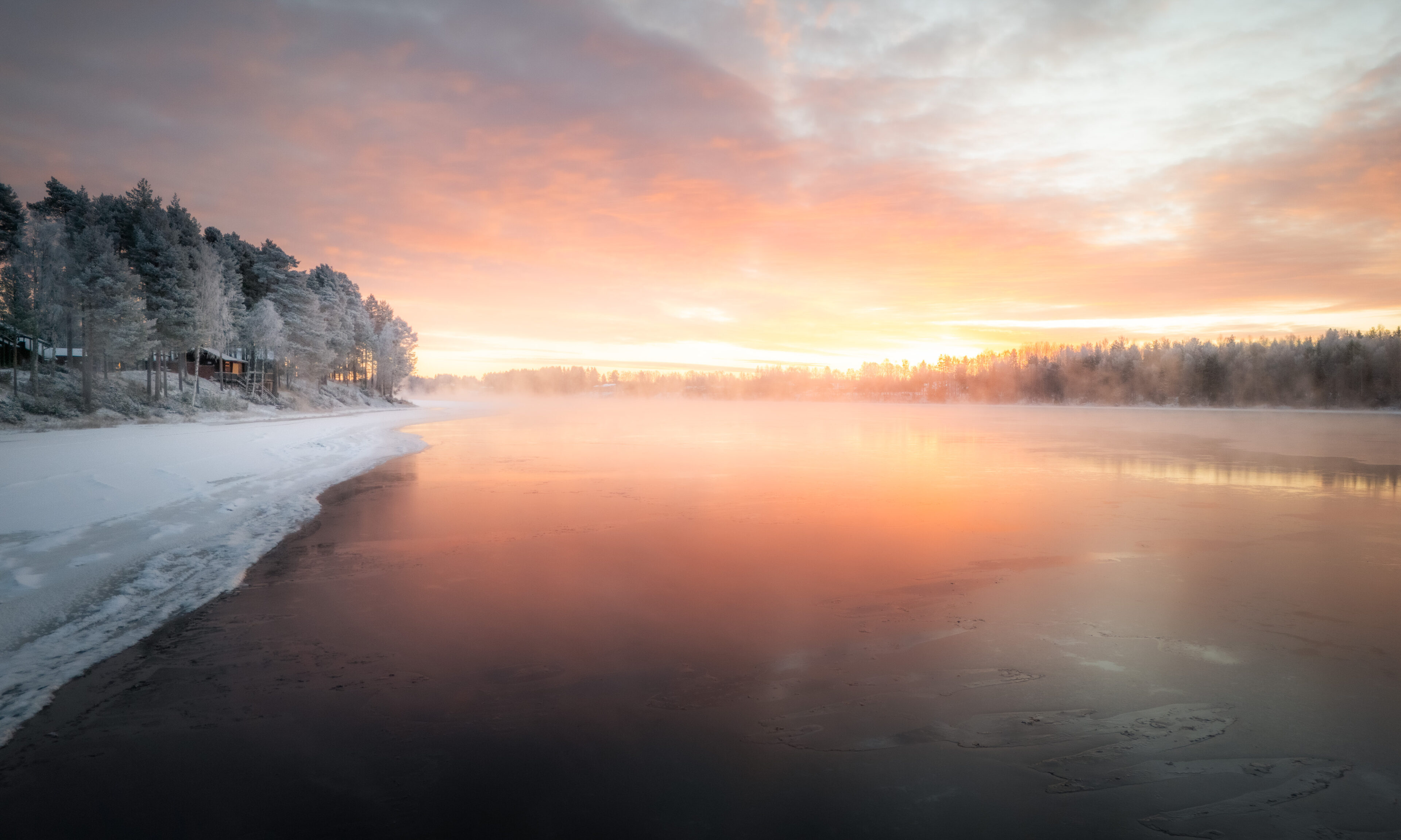 Sunrise in December at Aino Private Island Hotel, Rovaniemi, Lapland.