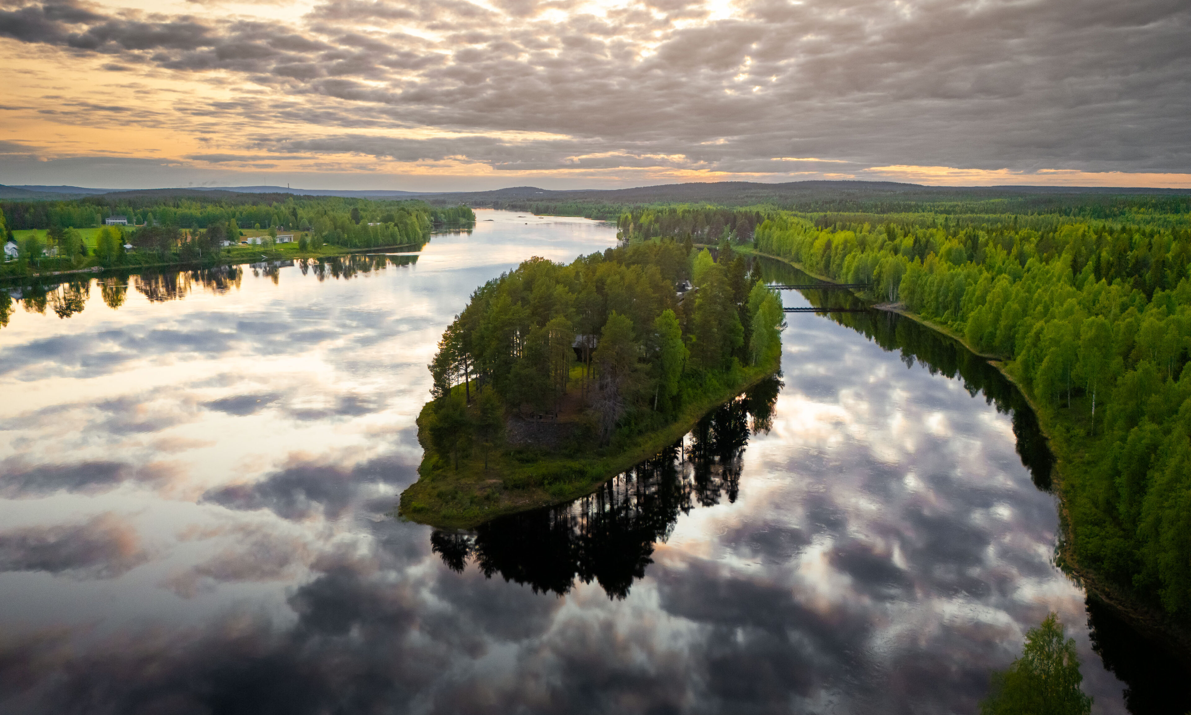 Aino Private Island Hotel wrapped around Kemijoki. Rovaniemi, Lapland.