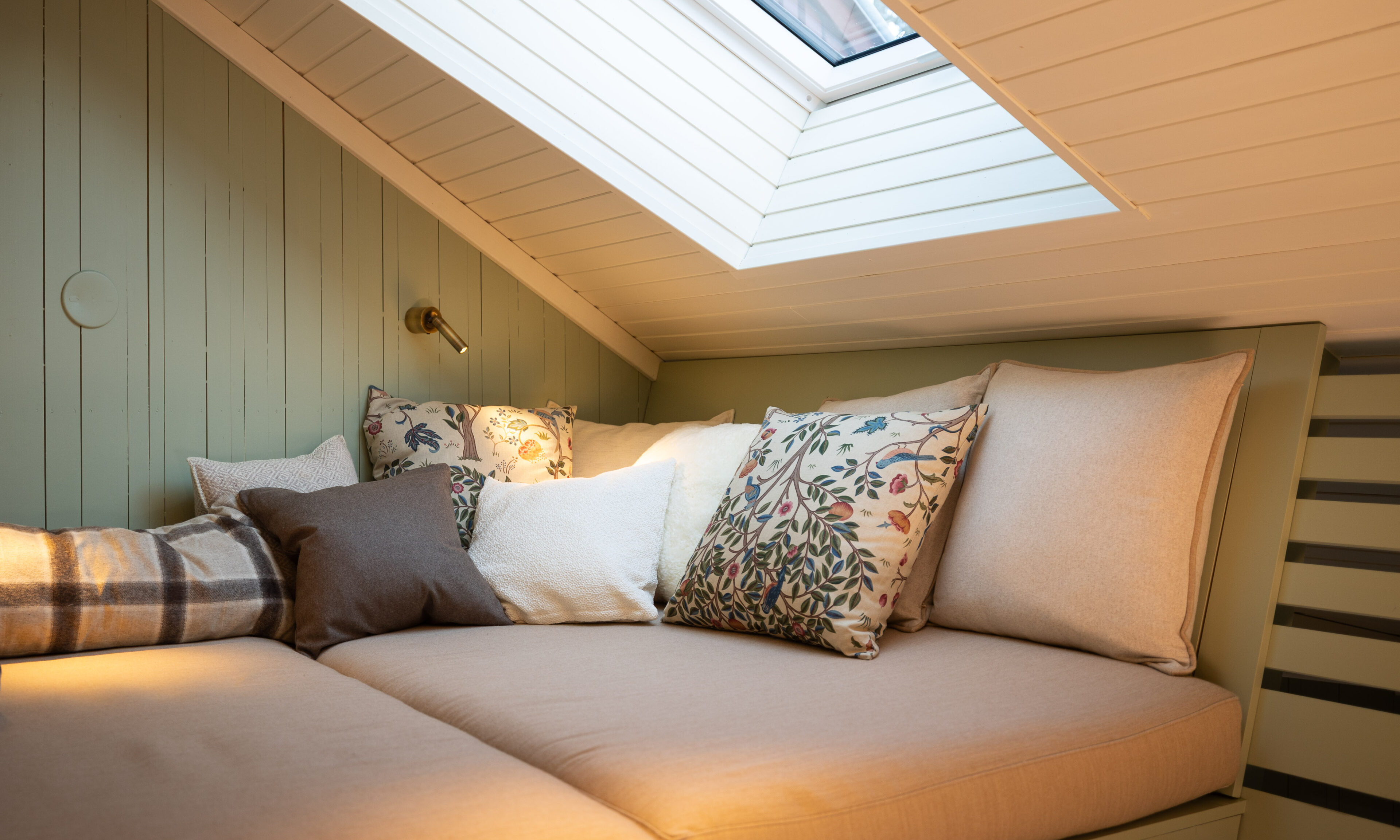Loft area with pillows at Aino Private Island Hotel, Rovaniemi, Lapland.