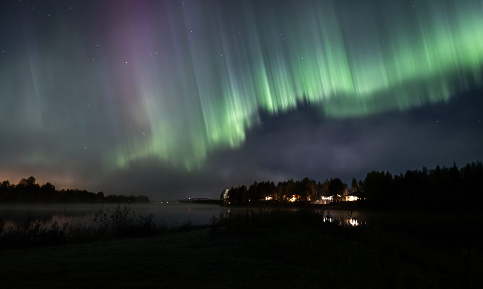 Northern Lights autumn time in Aino Private Island Hotel, Rovaniemi, Lapland.