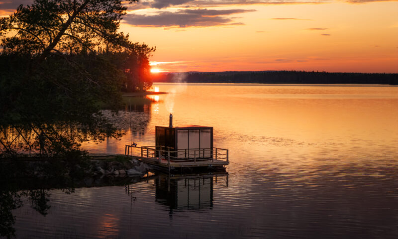 Floating Glass Sauna at the Aino Private Island Hotel, Rovaniemi, Lapland.